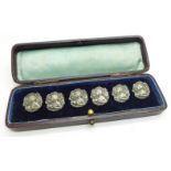 A set of six silver Art Nouveau buttons, cased