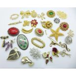 Thirty costume brooches