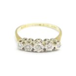An 18ct gold and platinum five stone diamond ring, 1.9g, L