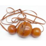 An amber necklet, 56g