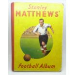 A Christmas 1949 Stanley Matthews' football album, signed "To Ray, Best Wishes, Stanley Matthews"