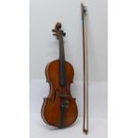 A ¾ violin and bow, cased, length of back without button, 33.5cm