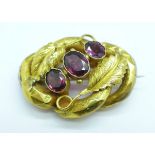 A Victorian yellow metal set three stone amethyst brooch, a/f, 8.1g