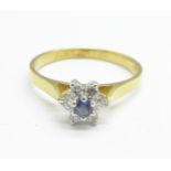 An 18ct gold, diamond and sapphire flower/cluster ring, 2.2g, M