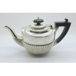 A silver teapot, finial a/f, hallmarks rubbed, 244g