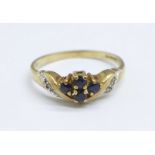 A 9ct gold, sapphire and diamond ring, 1.6g, N