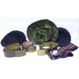 Three military hats/berets and four military belts including Russian, Royal Medical Corps, etc.