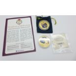 A 2010 The Royal Engagement of Prince William and Katherine Middleton coin, 24ct gold plated and a