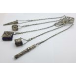 A late Victorian silver chatelaine, clip and pencil with London marks, the four other attachments