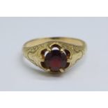 A 19th Century yellow metal and garnet ring, 3.8g, P (a/f, signs of old repair on shank)