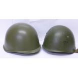 Two army helmets