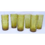 A set of six hand blown glass beakers