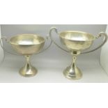 Two silver trophies, with 1930's inscriptions, total weight 630g, (one trophy weighted)