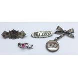 A Charles Horner brooch and three other silver brooches, Baby brooch lacking pin