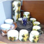 A Newlyn tea set, including 6 cups, 6 saucers, sugar bowl and a milk jug, two Royal Winton cups on