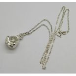 A 925 silver Buddhist monk pendant and chain