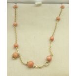 A 9ct gold and coral necklace, 3.1g