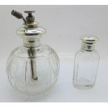 A silver top glass scent atomiser and a silver top scent bottle