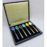 A cased set of six silver and enamel coffee spoons, one a/f, 76g