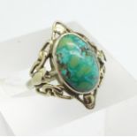 An 18ct white gold Arts and Crafts ring set with turquoise, 3.7g, K