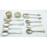 Seven silver spoons, a pair of silver sugar bows and two silver napkin rings, 180g