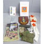 Royal Medical Corps arm bands, a sewing kit, books, an epipen for training, etc.