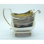 A silver cream jug, 180g