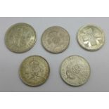 A 1938 half crown and four florins/two-shillings, fine condition