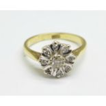 An 18ct gold and diamond cluster ring, 3.9g, L