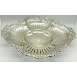 A large pierced silver basket, worn Chester hallmark, with inscription dated 1956, 820g, width 35cm