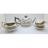 A three piece silver tea service, London 1878, 604g