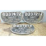 Three cast metal railway engine plaques