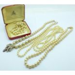 A faux pearl necklace with 9ct gold clasp and other faux pearl necklaces