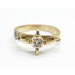 A yellow metal solitaire old cut diamond ring (tests equal or greater than 9ct gold), 2.9g, N