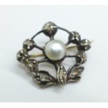 An Edwardian white metal old cut diamond and natural pearl set brooch (tests as high carat white