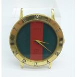 A Gucci wristwatch head