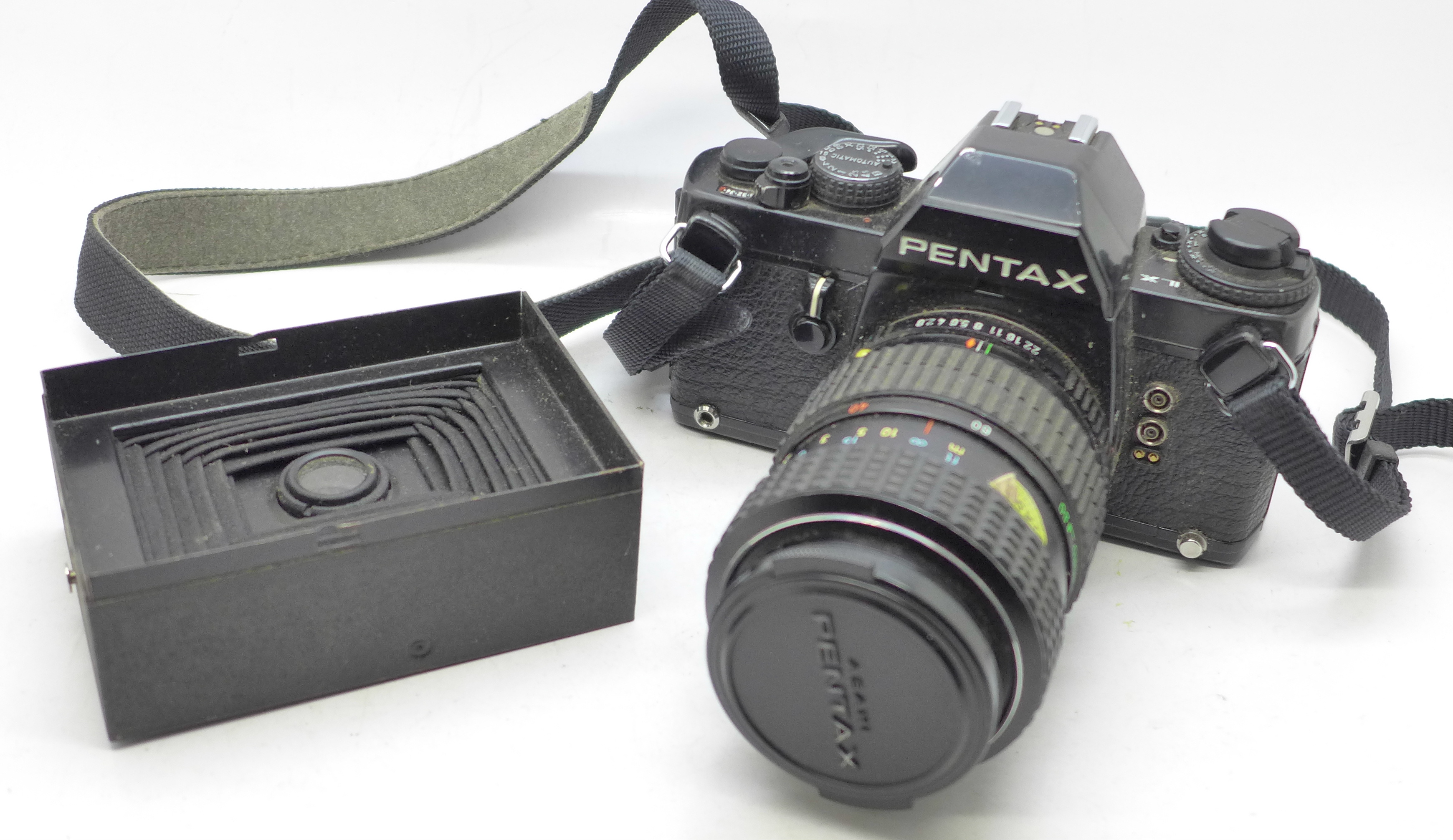 A Pentax ILX 35mm film camera with Pentax zoom lens and a Hawk-eye No 2 Folding Film Pack, 40-80mm