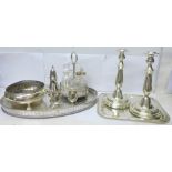Assorted plated ware; pair of candlesticks, two trays, sugar shaker, four bottle condiment set, etc.