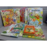 Nine Rupert annuals including a Rupert LP and cassette and other Rupert books