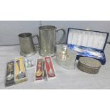 Two pewter tankards, a plated hip flask and a collection of plated and gold plated spoons **PLEASE