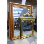 A gilt and teal framed mirror and a pine mirror