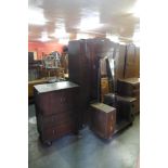 An Art Deco oak three piece bedroom suite