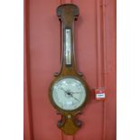 A Victorian walnut banjo barometer