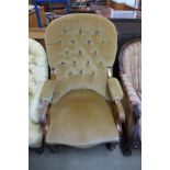 A Victorian mahogany and upholstered open armchair