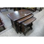 An Ercol dark nest of tables