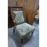 A Victorian mahogany and upholstered lady's chair