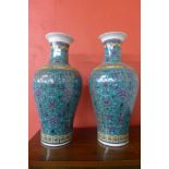 A pair of similar Chinese poreclain famille vert vases