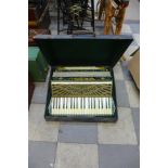 An Italian Scandalli piano accordian, cased
