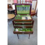 An Edward VII mahogany cased plated canteen of cutlery on stand, Walker & Hall, Sheffield