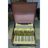 A Hohner Verdi I piano accordian, cased